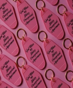 The Little Apple HOMEBODY God Bless My Sh*tty Overpriced Apartment Motel Keychain